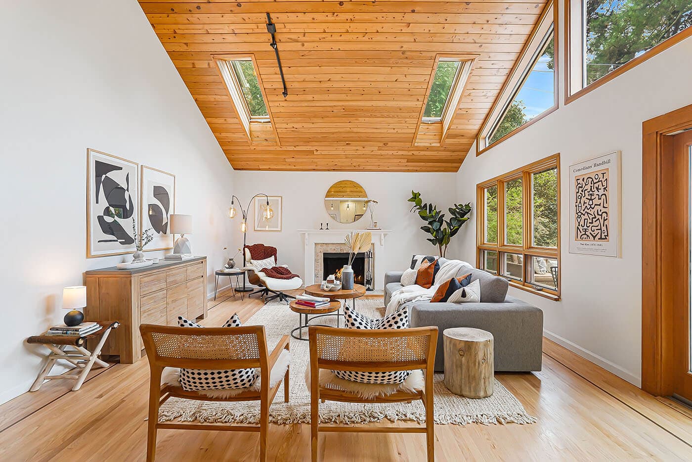 A vaulted living room in natural wood, photographed by a member studio