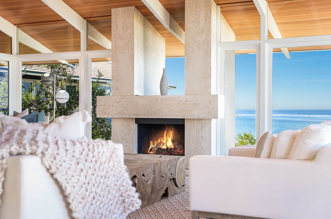 A fireplace lounge with ocean views, photographed by a member studio